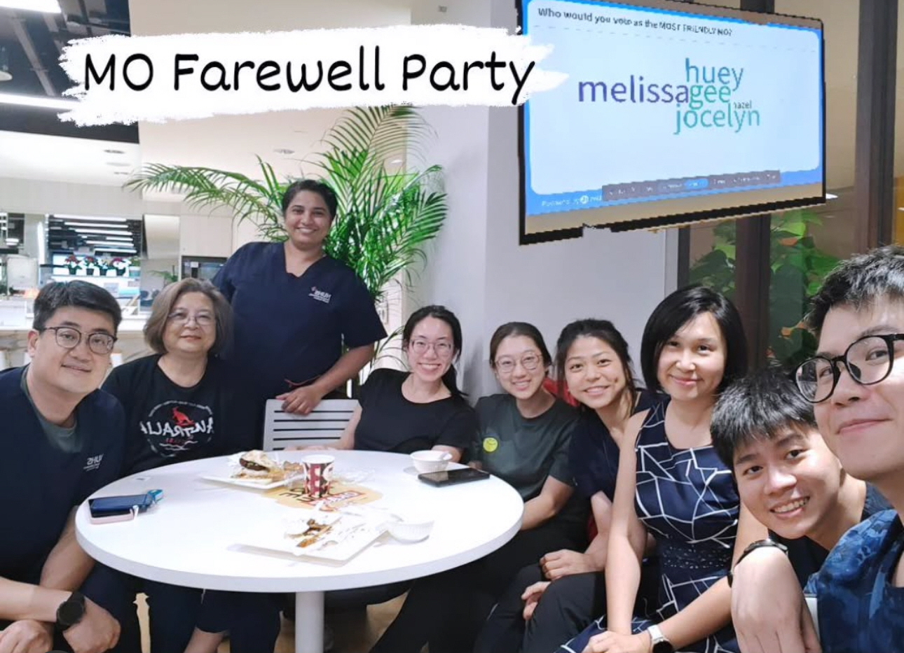 Colleagues gathered at a medical officer farewell